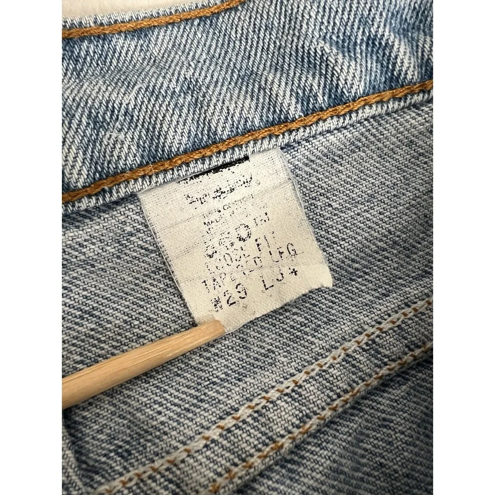 Vintage 90s Levis 560 Loose Fit Tapered Leg Jeans 29x34 Made in USA Light Wash